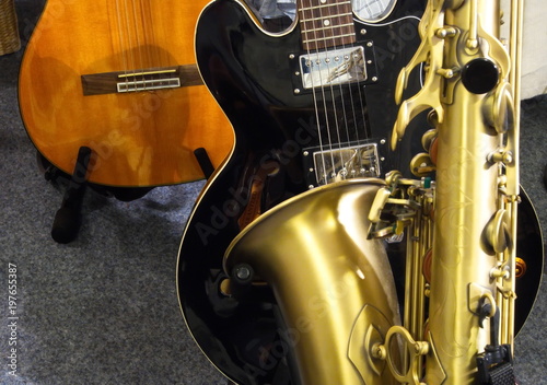 Bild auf Leinwand Two guitars and a saxophone