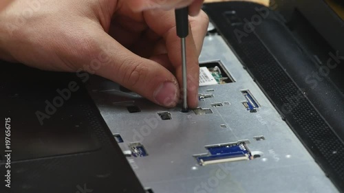 Wallpaper Mural Small screw removed from back of laptop Torontodigital.ca