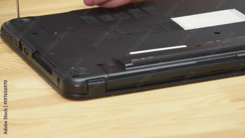 Small screw removed from back of laptop Small screw removed from back of laptop
