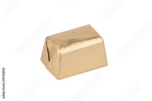 closeup of chocolate bar in golden packaging