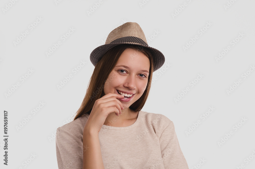 Attractive young girl portrait. Beautiful female looking at camera. Healthy woman studio portrait. Attractive young girl portrait. Beautiful female looking at camera. Healthy woman studio portrait.