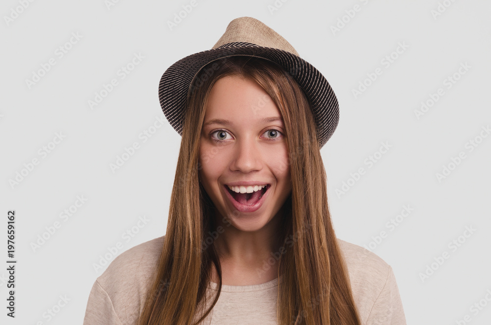 Attractive young girl portrait. Beautiful female looking at camera. Healthy woman studio portrait. Attractive young girl portrait. Beautiful female looking at camera. Healthy woman studio portrait.