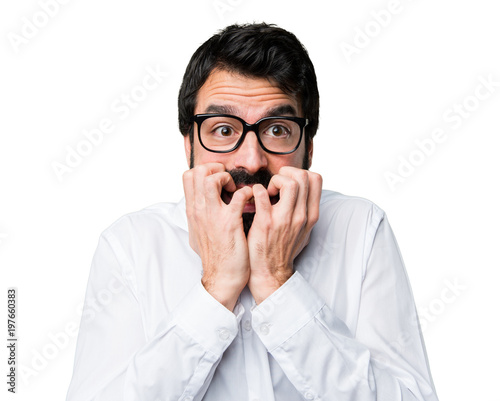 Frightened handsome man with glasses