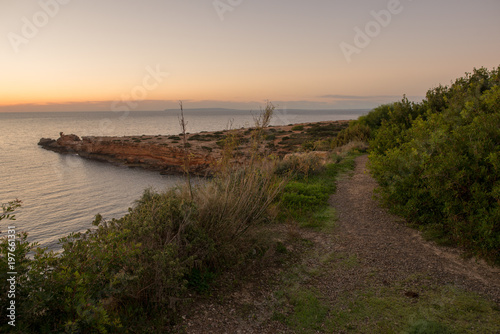 Sunrise at the Cala Sa Punta in Ibiza