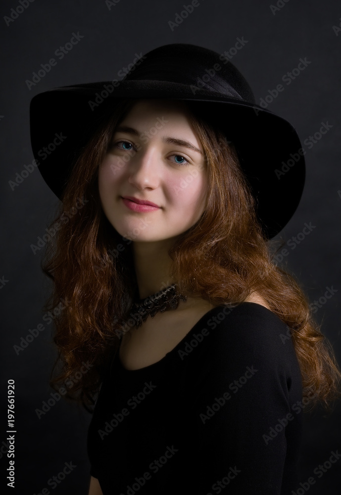Young beautiful elegant woman in a hat. Retro style Young beautiful elegant woman in a hat. Retro style