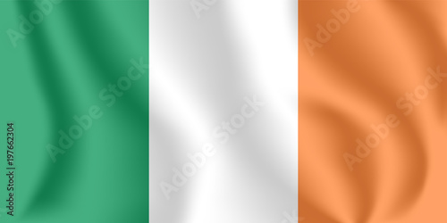 Flag of Ireland. Realistic waving flag of Republic of Ireland. Fabric textured flowing flag of Ireland.