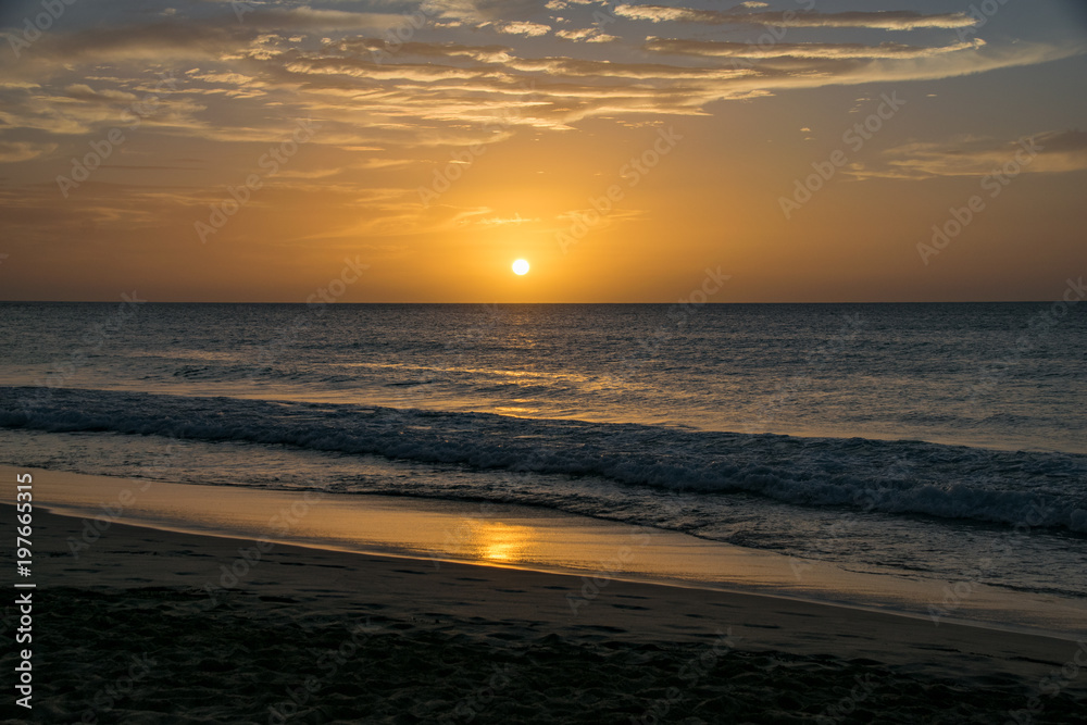 Sunset over the Atlantic Ocean from the beach at Boa Vista, Cape Verde