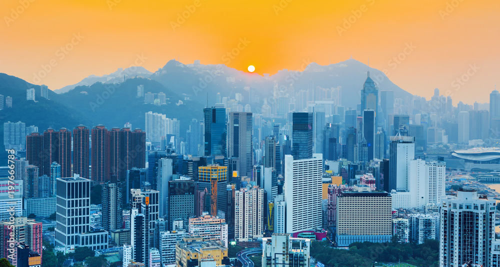 Amazing view on Hong Kong city skyline and the Victoria peak at the sunset, China