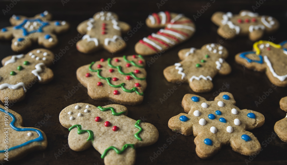 Close-up of gingerbread cookies in baking sheet Close-up of gingerbread cookies in baking sheet