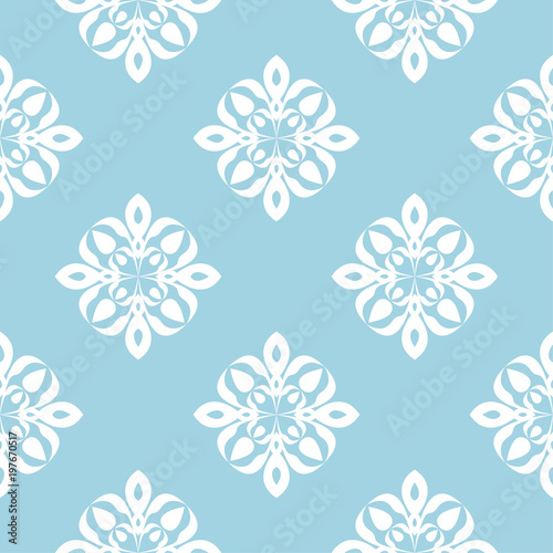 White floral seamless pattern on blue background