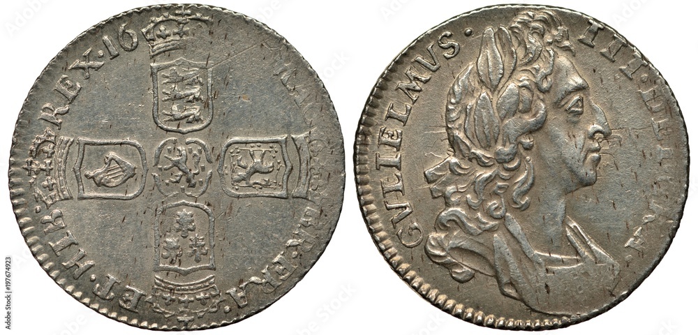 Fototapeta premium United Kingdom British silver coin 6 six pence 169?, four crowned shields with lions, lily and harp in cross-like pattern, bust of King William III right, 