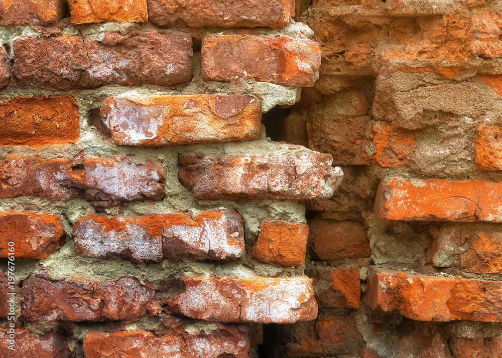 A fragment of a brick wall. A fragment of a brick wall.