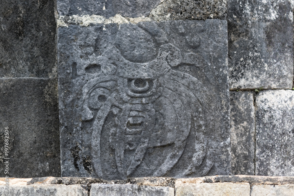 Mayan bas relief detail on the walls of the ball game court