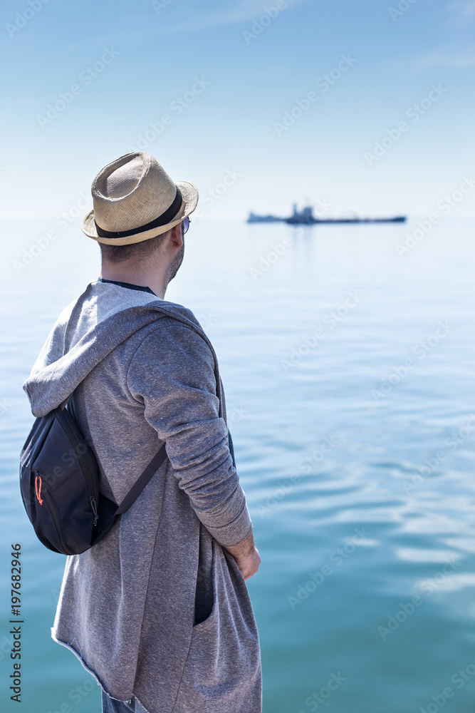 Traveler on the port of Thessaloniki, Greece Traveler on the port of Thessaloniki, Greece