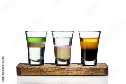 three cocktails on a white background