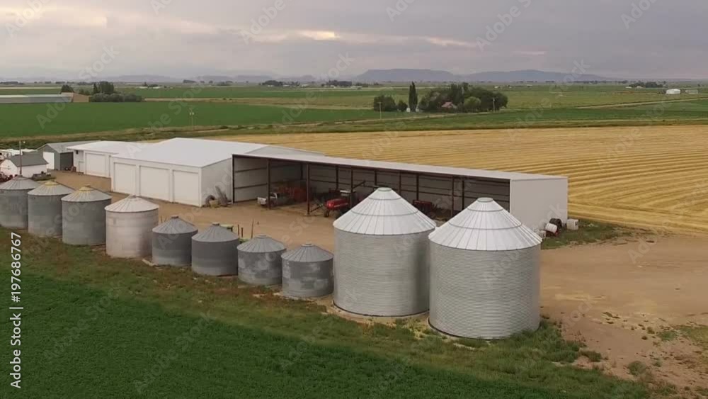 Drone flyover of silos on wheat farm Drone flyover of silos on wheat farm