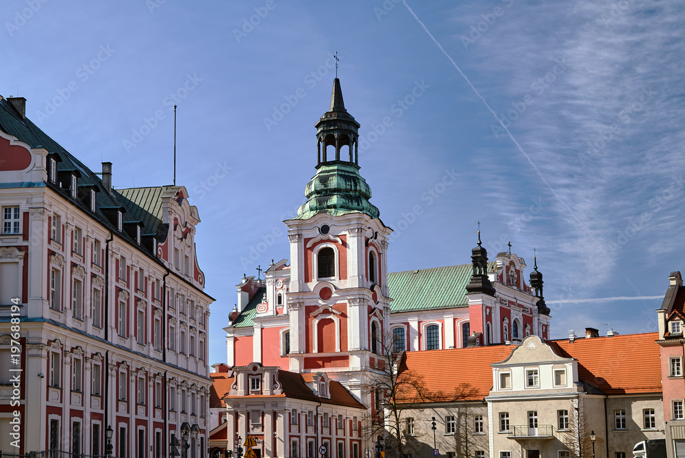 building and belfry of baroque Catholic Church in Poznan.