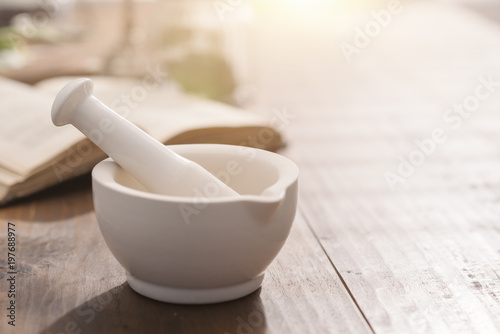 Mortar and pestle on the pharmacist's table