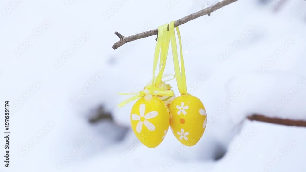 Easter eggs in winter snow
