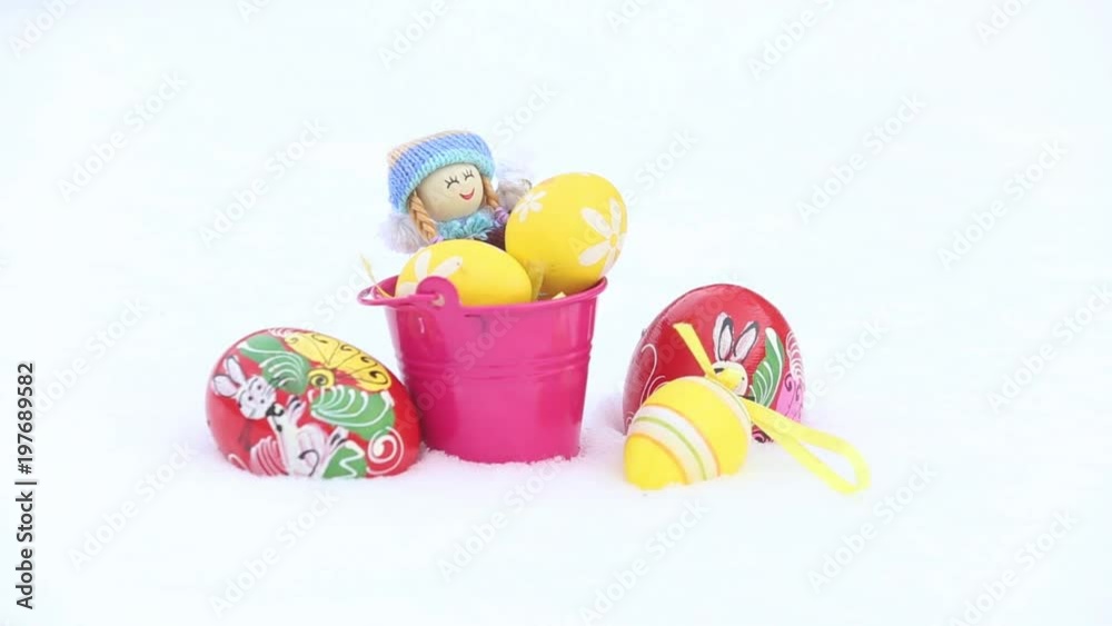 Easter eggs in winter snow
