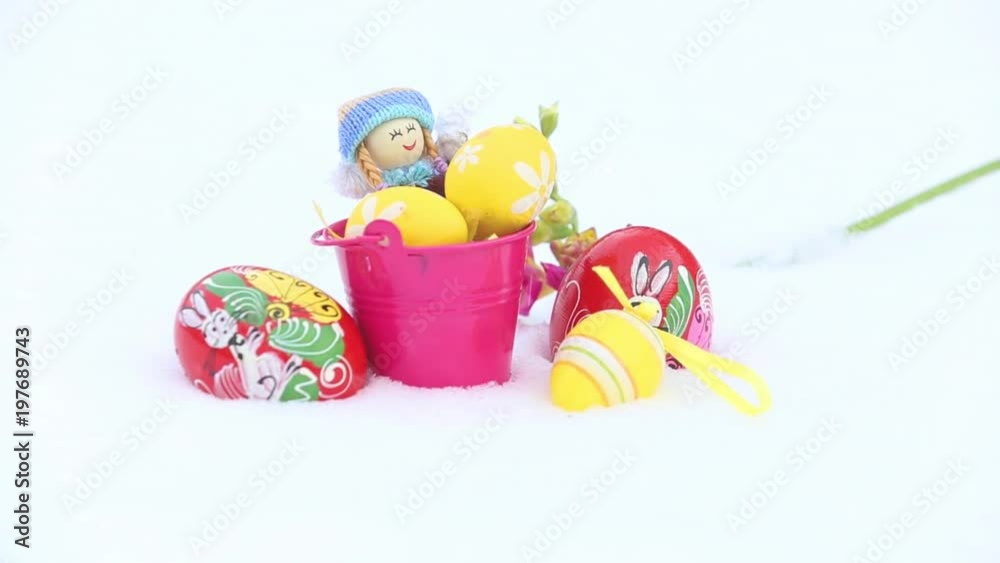 Easter eggs in winter snow
