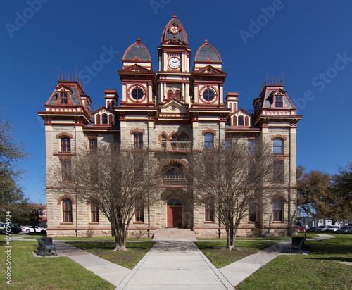 triangular sidewalk surrounding the courthouse in Lockhart Texas photo