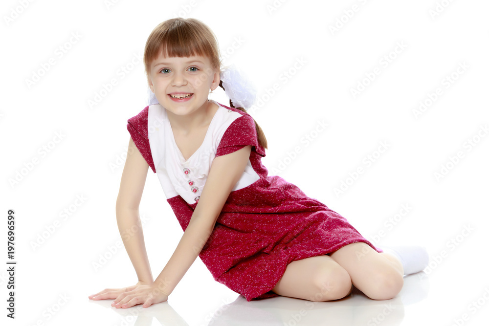 Little girl in a red dress. Little girl in a red dress.