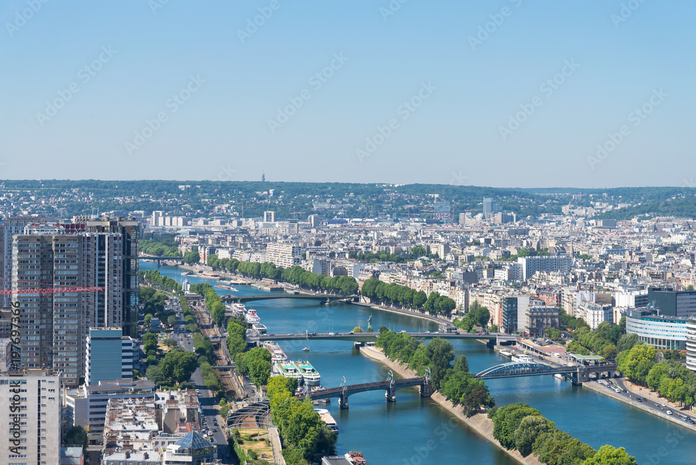 Obraz premium View of skyline Paris from top view. Cityscape of Paris from Eifel tower. Cityscape and Seine river from top view at Eifel tower.