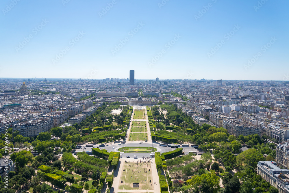View of skyline Paris from top view. Cityscape of Paris from Eifel Tower.  Cityscape and Champ de Mars from top view at Eifel tower. 