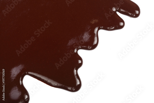 Melted chocolate dripping isolated on white background