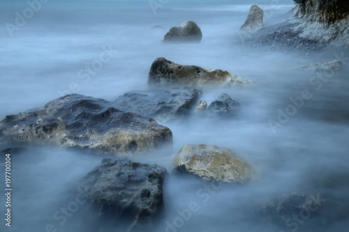 Rocks and blurred sea waves on the Jurassic Coast
