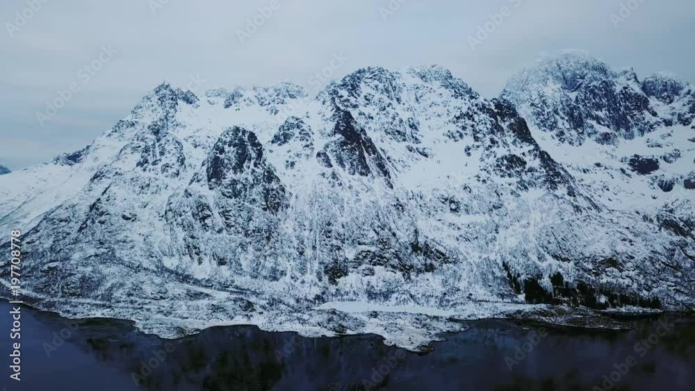 custom made wallpaper toronto digitalView of mountain landscape in Northern Norway, Lofoten Islands, Nordland, on the way to Ryten mountain and Kvalvika beach, with a groups of hikers, and mountains around, sunny winter day
