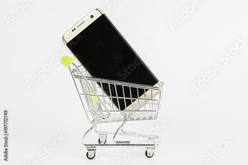 Mini trolley carrying a mobile phone