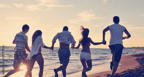 people group running on the beach