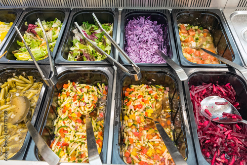 Colorful salads at a buffet in a restaurant photo