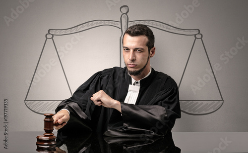 Young judge in gown deciding