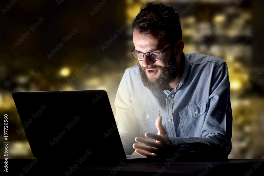 Businessman in the office at night Businessman in the office at night
