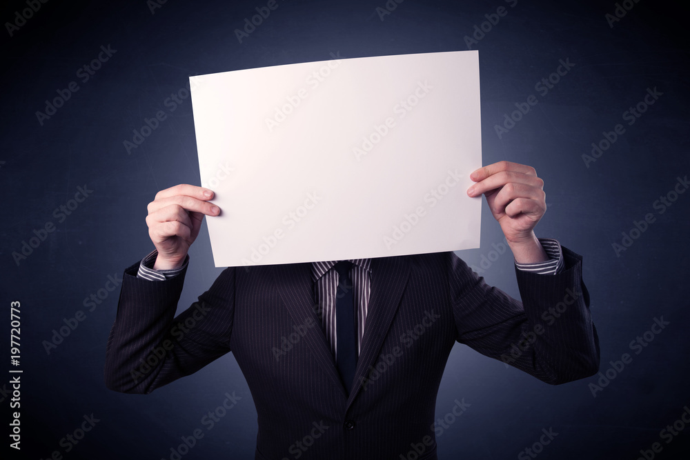 Businessman holding blank paper Businessman holding blank paper