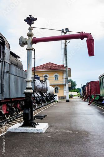 Old water crane for steam locomotives photo