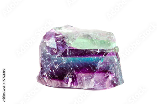 Macro shooting of natural gemstone. Raw mineral fluorite, Brazil. Isolated object on a white background.