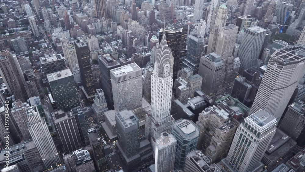 New York City aerial view of Midtown Manhattan orbiting the Chrysler Building at dusk