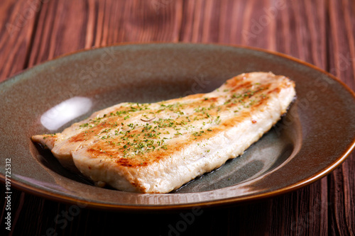 Fried fillet of bighead carp fish
