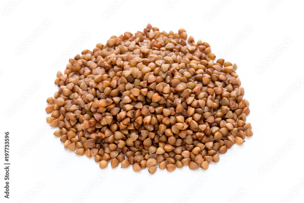 Buckwheat grains isolated on the white background. Buckwheat grains isolated on the white background.