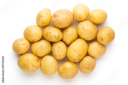 New potato and rosemarin isolated on white background close up.