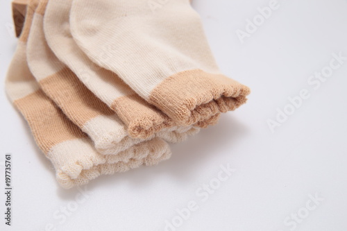 yellow sock close-up on isolated white background