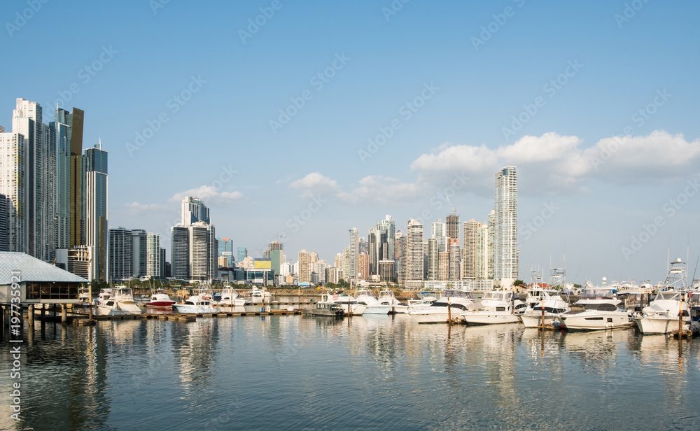 Vacations and Tourism Concept -  modern yachts at harbor in Panama with city skyline