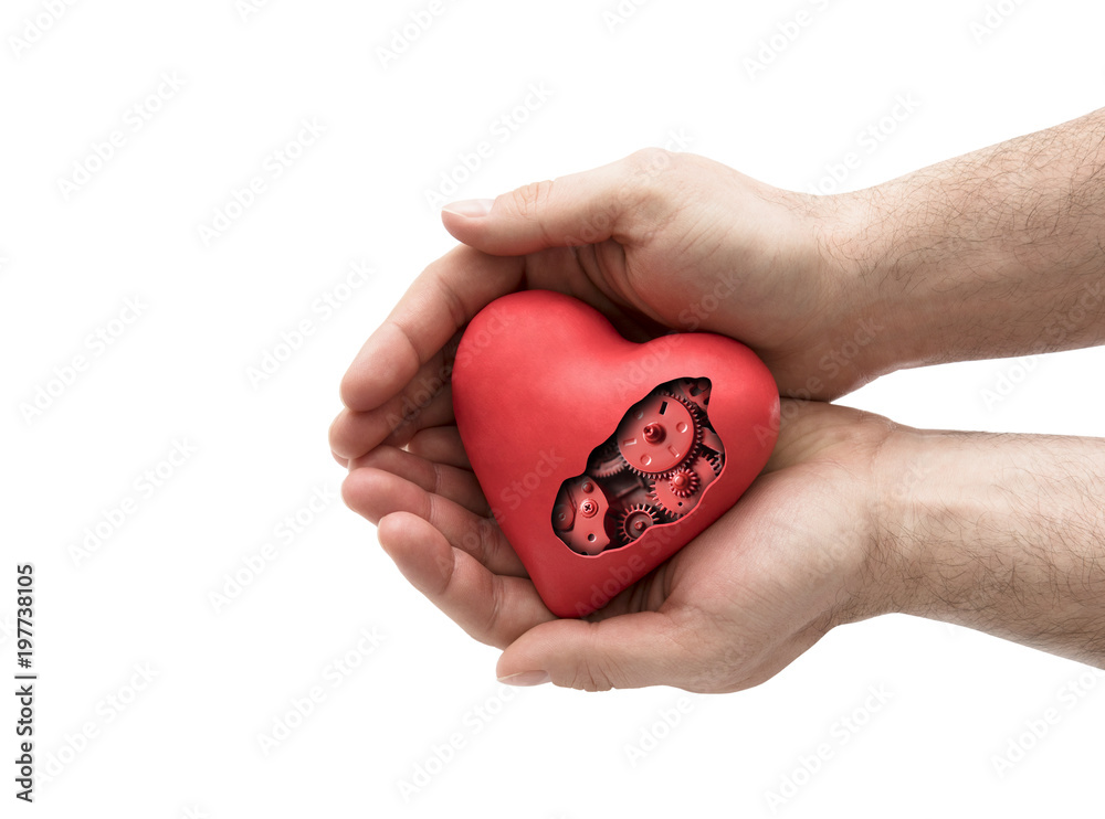 Red mechanical heart in hands isolated on white with clipping path Red mechanical heart in hands isolated on white with clipping path