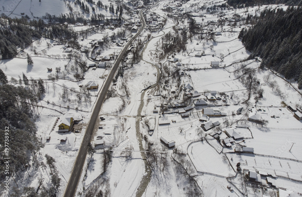 Fototapeta premium aerial view of village in the winter. Romania, Moldavia