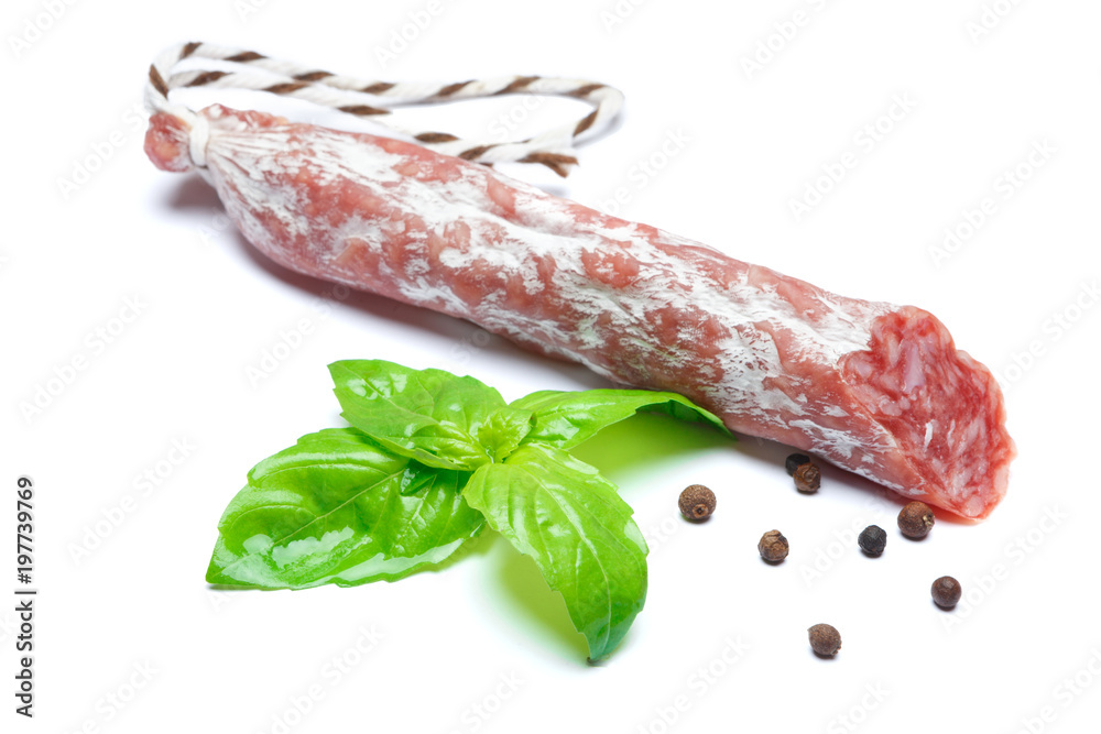 Dried organic salami sausage on white background Dried organic salami sausage on white background