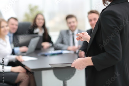 business woman with documents on blurred background office